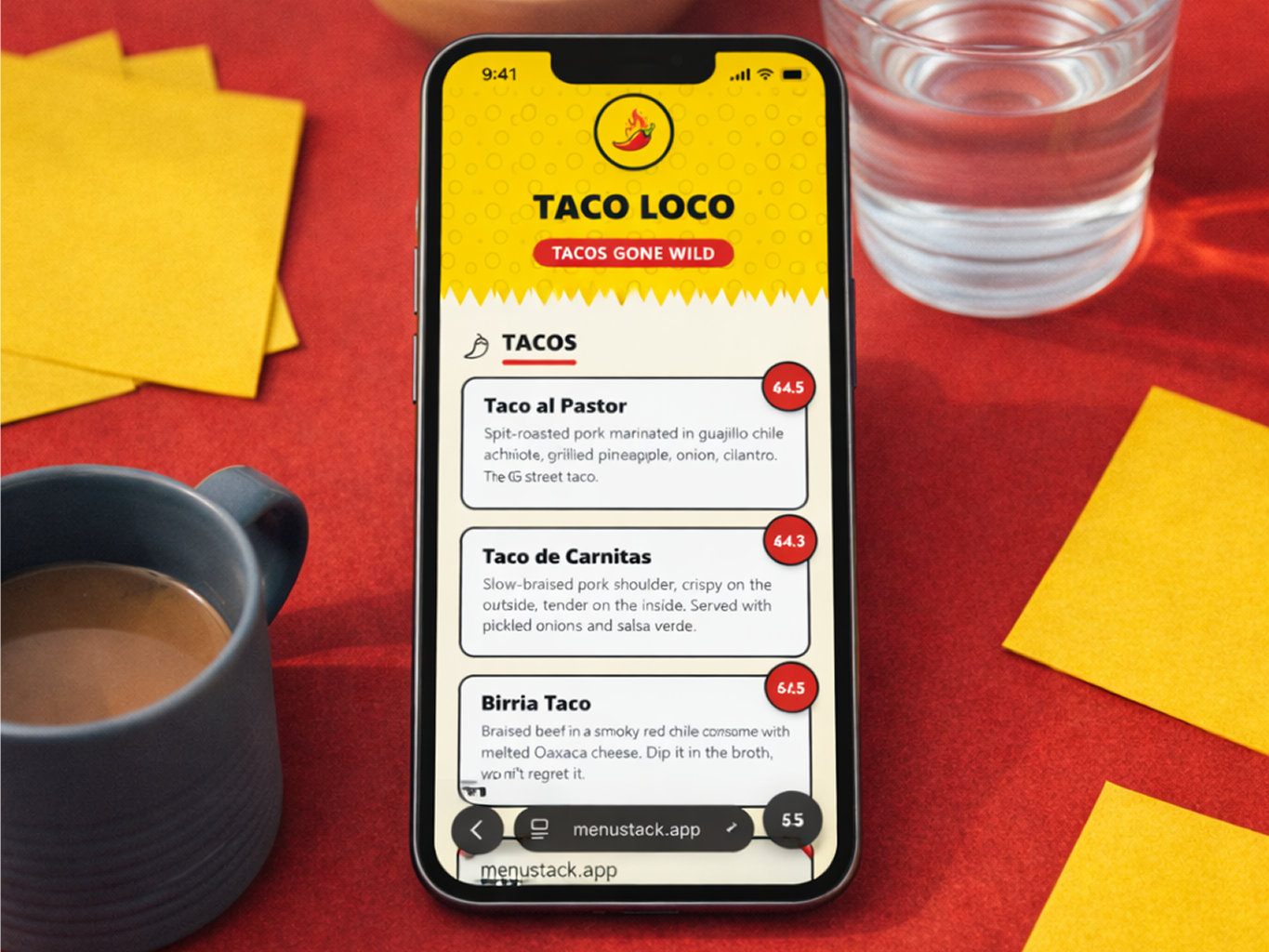 Agency team reviewing restaurant QR menu designs on a laptop